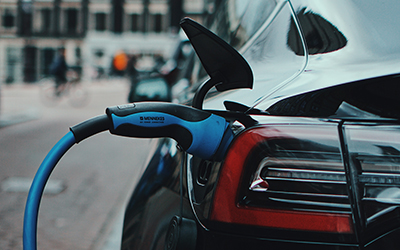 Electric vehicle connected to a charging cable