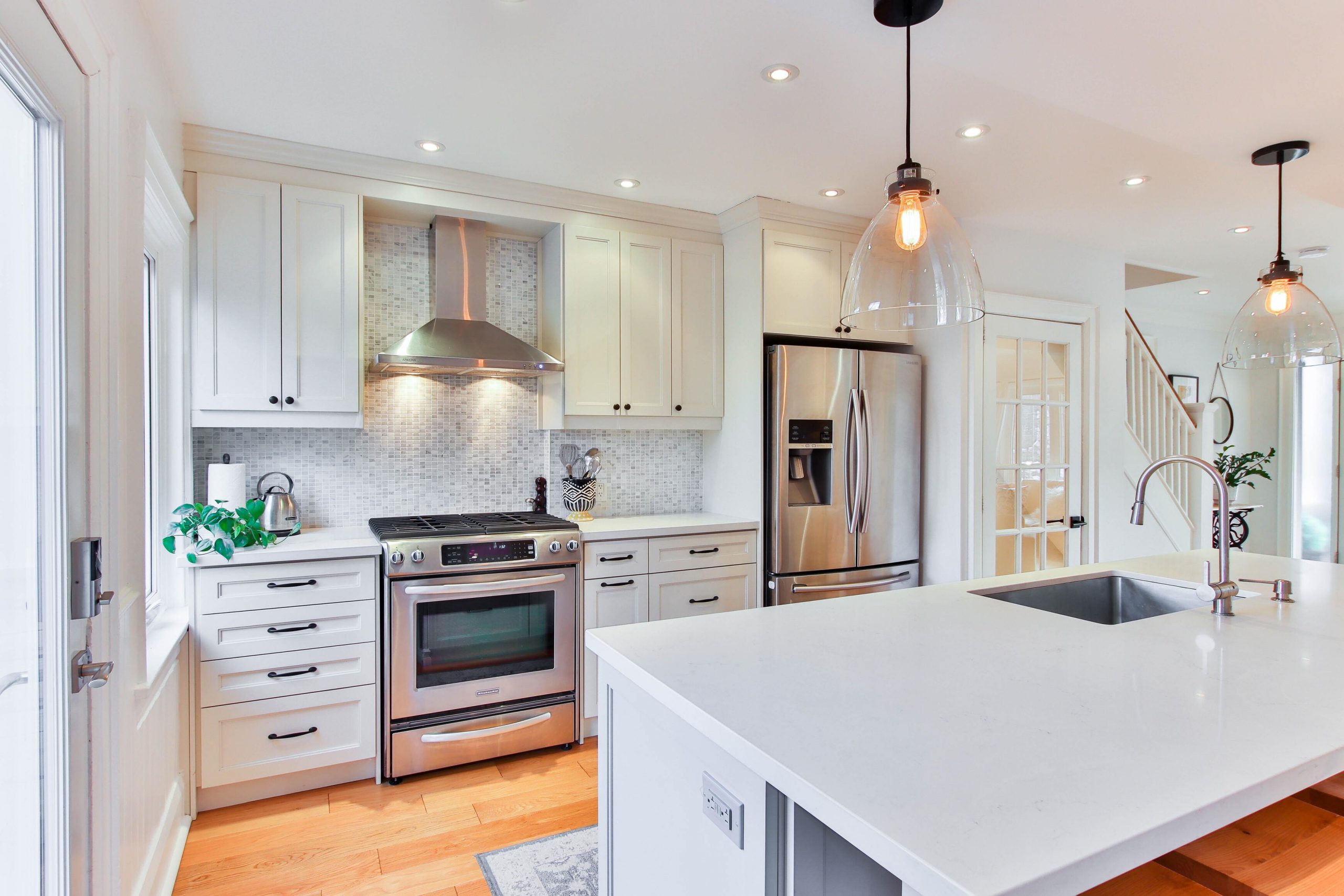 Kitchen with pendant lighting, recessed ceiling lights and under-cabinet illumination